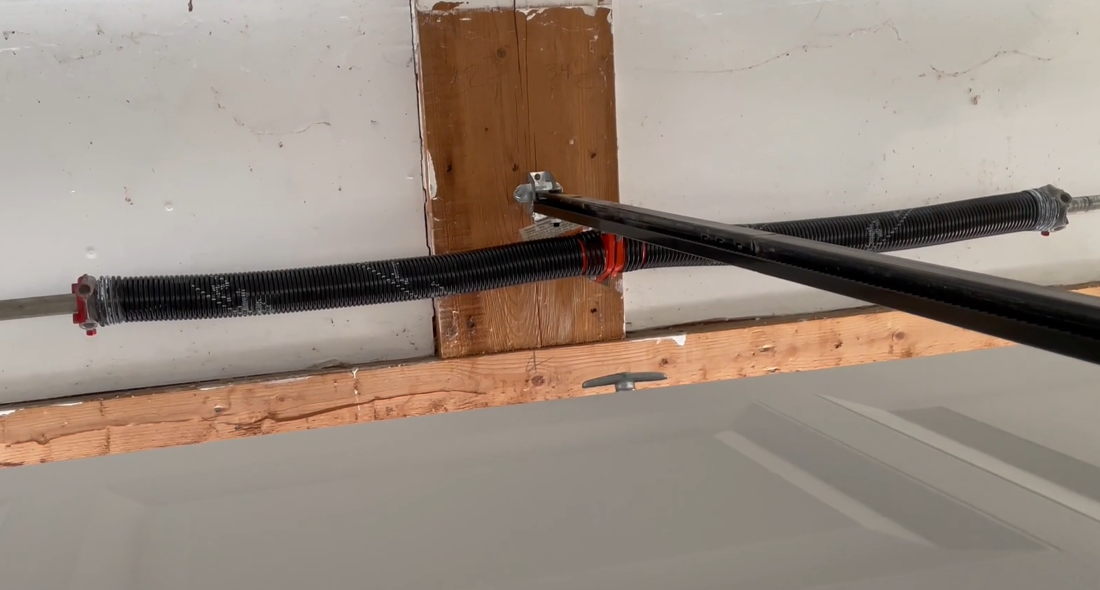 Garage door spring repair.